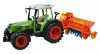 Traktor tárcsázó vontatmánnyal