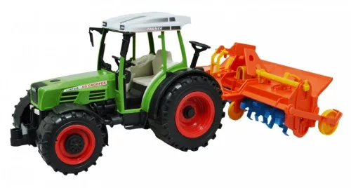 Traktor tárcsázó vontatmánnyal